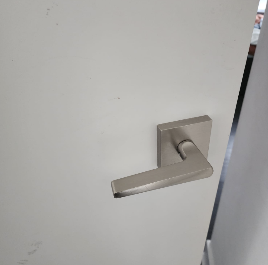 Pushing down on a door handle